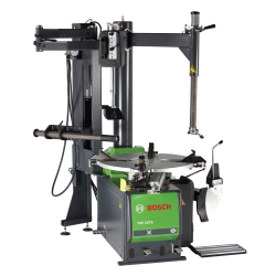 Tire changer with swing arm.